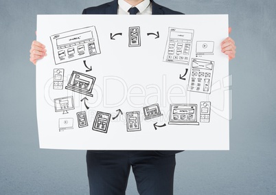 Businessman holding card with business graphics drawings