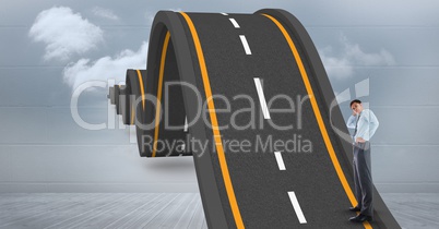 Digital composite image of businessman standing on wavy road