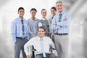 Portrait of confident business people against blurred background