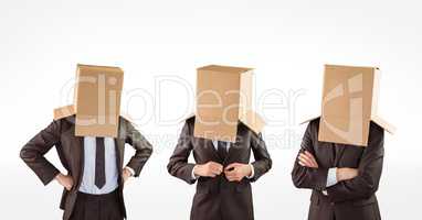 Multiple image of businessmen with cardboard boxes covering head