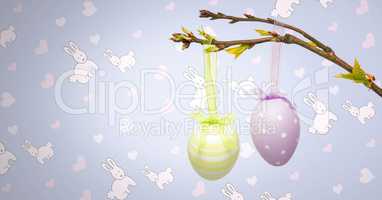 Easter eggs on branch in front of pattern