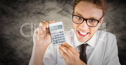Nerd with calculator against brown grunge background