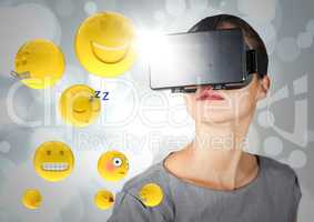 Woman in VR with emojis and flares against white bokeh