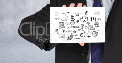 Businessman holding card with business graphics drawings