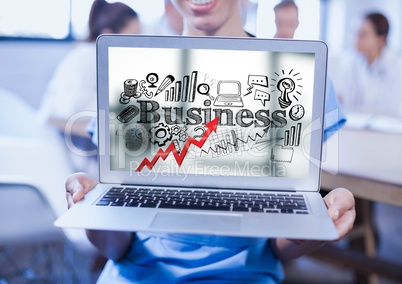 Woman holding laptop showing red arrow with black business doodles against blurry background