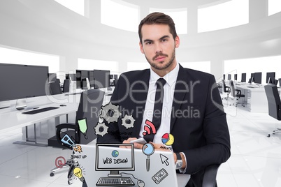 Businessman using devices with colorful  business doodles
