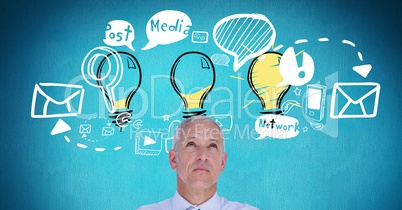 Digital composite image of businessman with idea icons