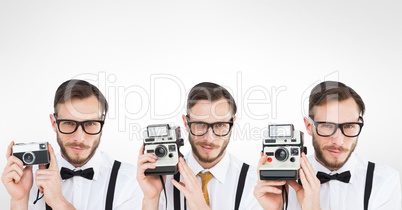 Multiple image of man using retro camera