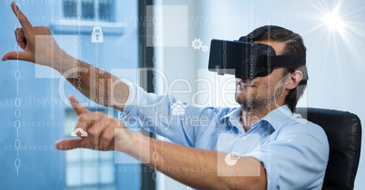 Digitally generated image of various icons with businessman using VR glasses in office