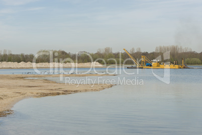 Sand extraction on a recreational Lake.
