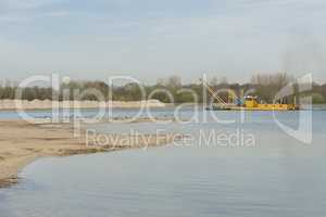 Sand extraction on a recreational Lake.