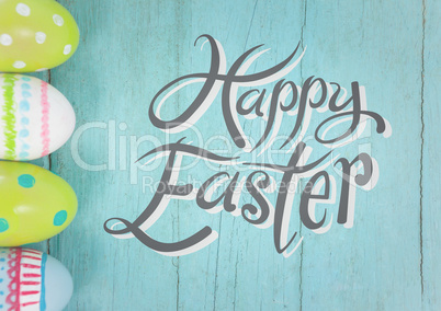 Grey easter graphic against teal table with eggs