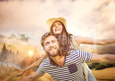 Couple flying in the mountain
