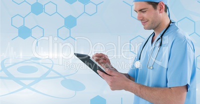 Nurse (men) catching notes with his tablet