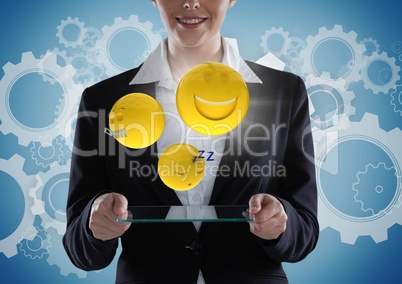 Business woman with glass device and emojis with flare against blue background with gears