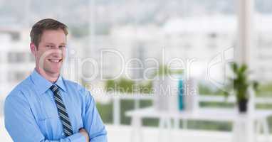 Happy business men in the office with his hands folded. Blurred background.