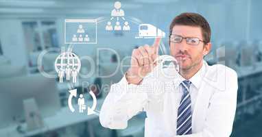 Businessman touching icons on transparent screen