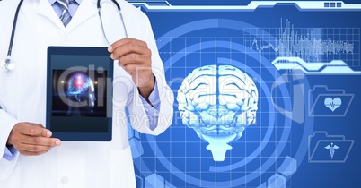 Midsection of doctor showing human brain on tablet PC against screen
