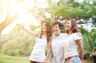 Mother and daughter outdoors