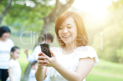 Woman texting outdoor