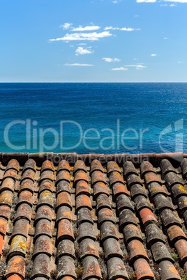 Tile roof and blue sea