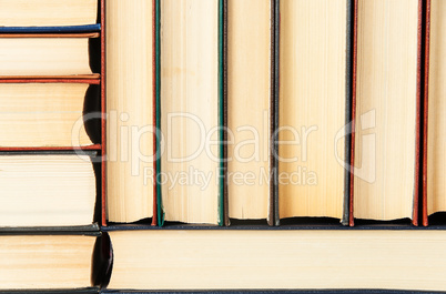 Abstract background of stacked on each other old books