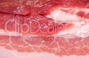 Background of slice of fresh pork bacon
