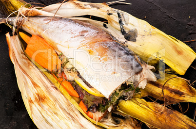 Baked mackerel with vegetables and herbs