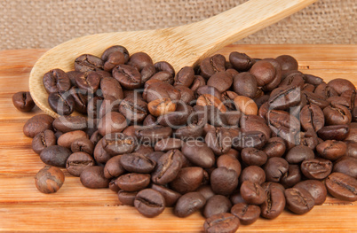 Coffee beans on a wooden lattice