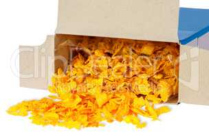 Corn flakes spill out of cardboard box