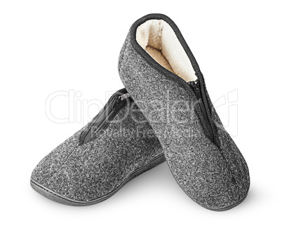 Dark gray slippers with fur one on another
