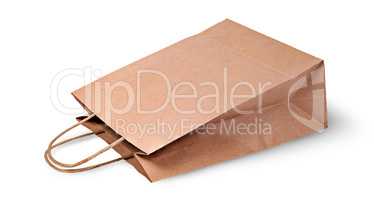 Empty open brown paper bag for food lying