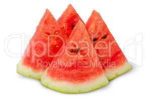 Four slices of ripe watermelon near