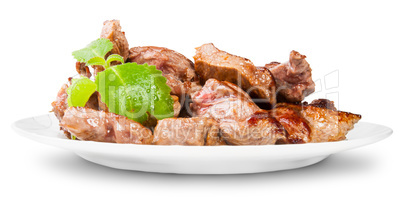 Grilled Meat On A White Plate Rotated Served With Mint Leaf