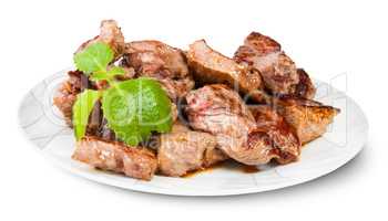 Grilled Meat On A White Plate Served With Mint Leaf