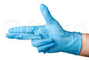 Hand in blue latex glove fingers pistol
