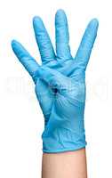 Hand in blue latex glove showing four fingers