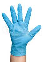 Hand in blue latex glove