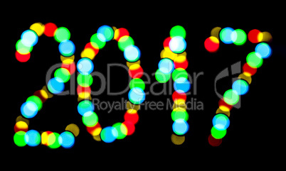 Happy New Year 2017 written blurred lights