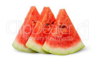 In front threel slices of watermelon stacked ladder