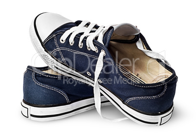 One pair of dark blue sports shoes on one another