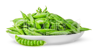 Opening and closing pea pods on white plate