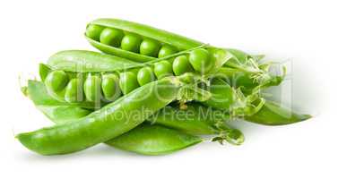 Pile green peas in pods
