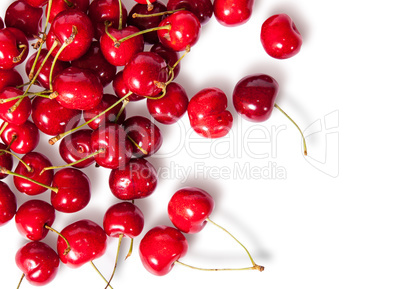 Pours pile of juicy sweet cherries