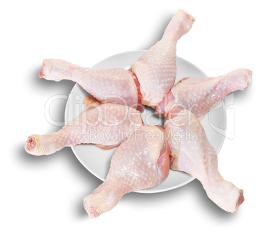 Raw Chicken Legs As A Star On White Plate
