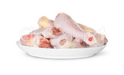 Raw Chicken Legs On White Plate