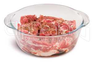 Raw Pork With Spices In A Glass Bowl