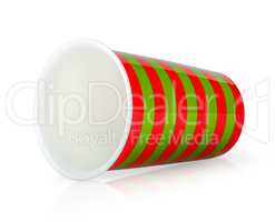 Red and green cup without handle lying down