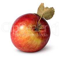 Red ripe apple with leaf top view