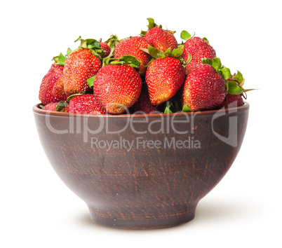 Ripe juicy strawberries in a ceramic bowl